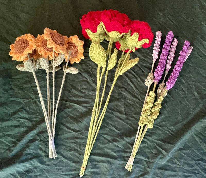 Crochet flower bouquet set with orange, red, and purple blooms on long stems