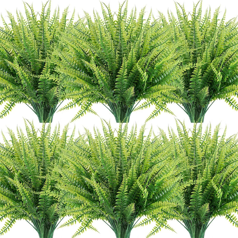 Green artificial Boston fern bunches with dense leaf fronds