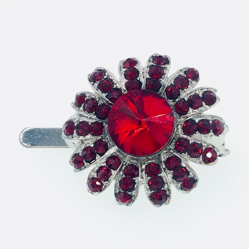 Red rhinestone flower hair clip with crystal petals and silver barrette base