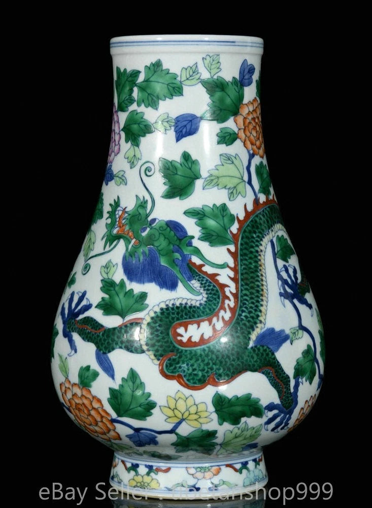 Chinese doucai porcelain vase with dragon and peony flower pattern, white body