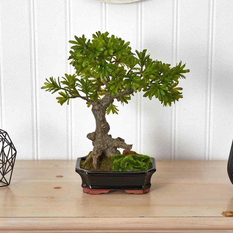 Artificial bonsai tree with moss in a dark rectangular planter for home decor