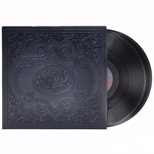 Vinyl LP record with dark blue embossed sleeve and rose emblem, black vinyl visible