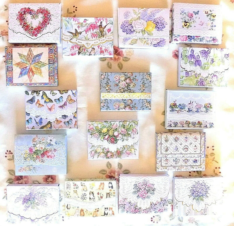 Blank note card portfolio with assorted floral bouquet designs, multiple cards