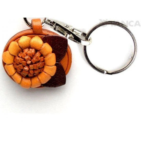 Leather sunflower flower keychain with metal ring and orange-brown layered petals