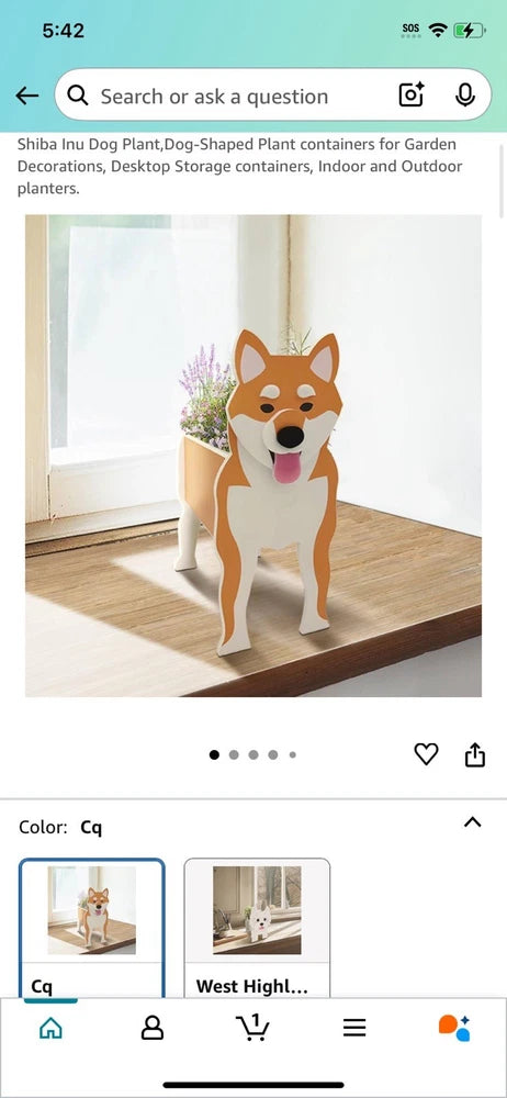 Shiba Inu dog-shaped planter painted tan and white, holds outdoor plants
