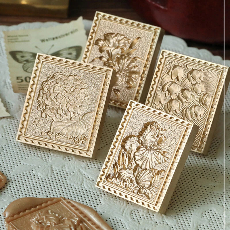 Brass wax seal stamp with embossed iris flower design, square frame