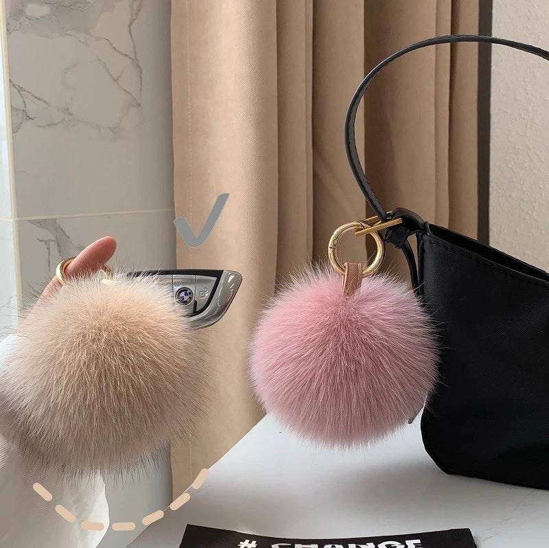 Faux fur pompom keychain with metal keyring, pink and light tan fur balls