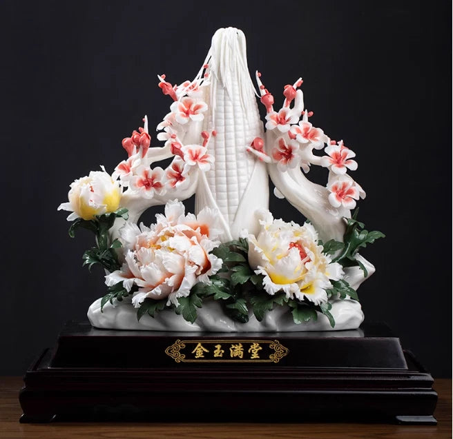White porcelain statue with peony and plum blossom flowers, on dark rectangular base