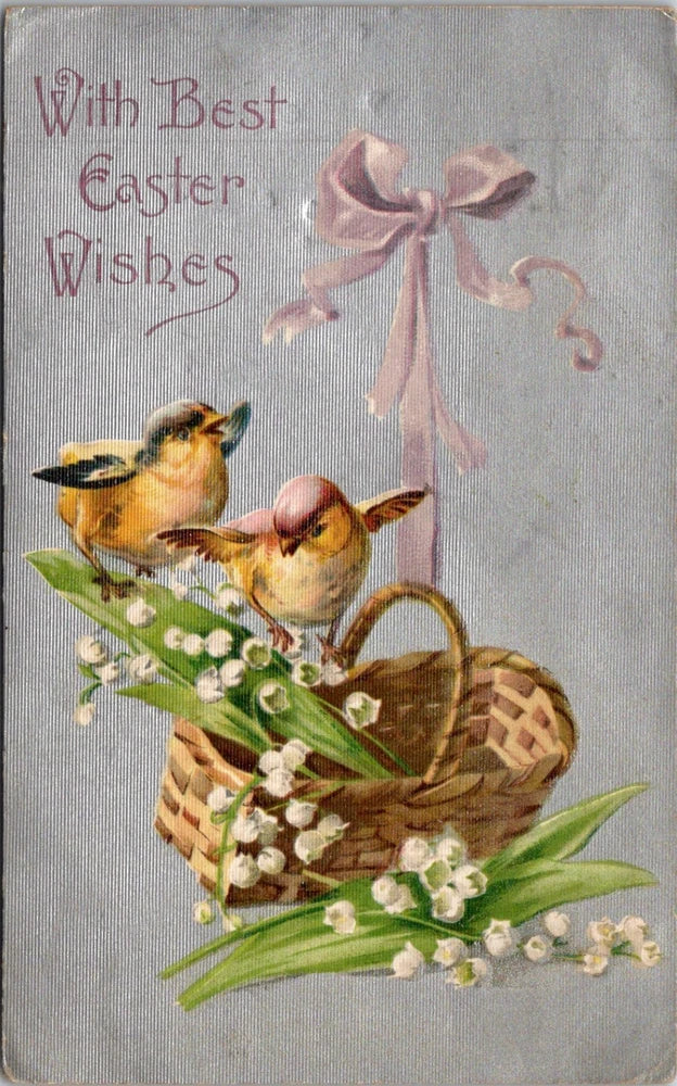 Easter postcard with chicks in a basket, lily-of-the-valley flowers, and a ribbon bow