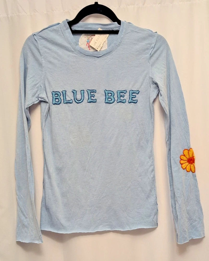BLUE BEE light blue long-sleeve graphic top with bee text and orange flower on sleeve