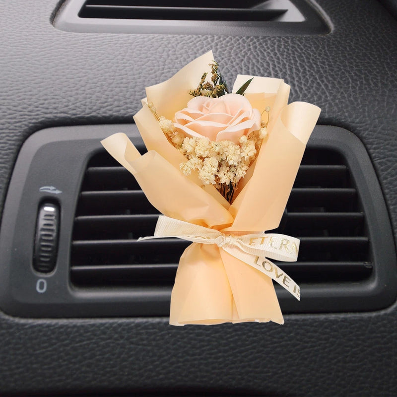 Dried flower car vent clip scent diffuser with peach rose and beige filler flowers