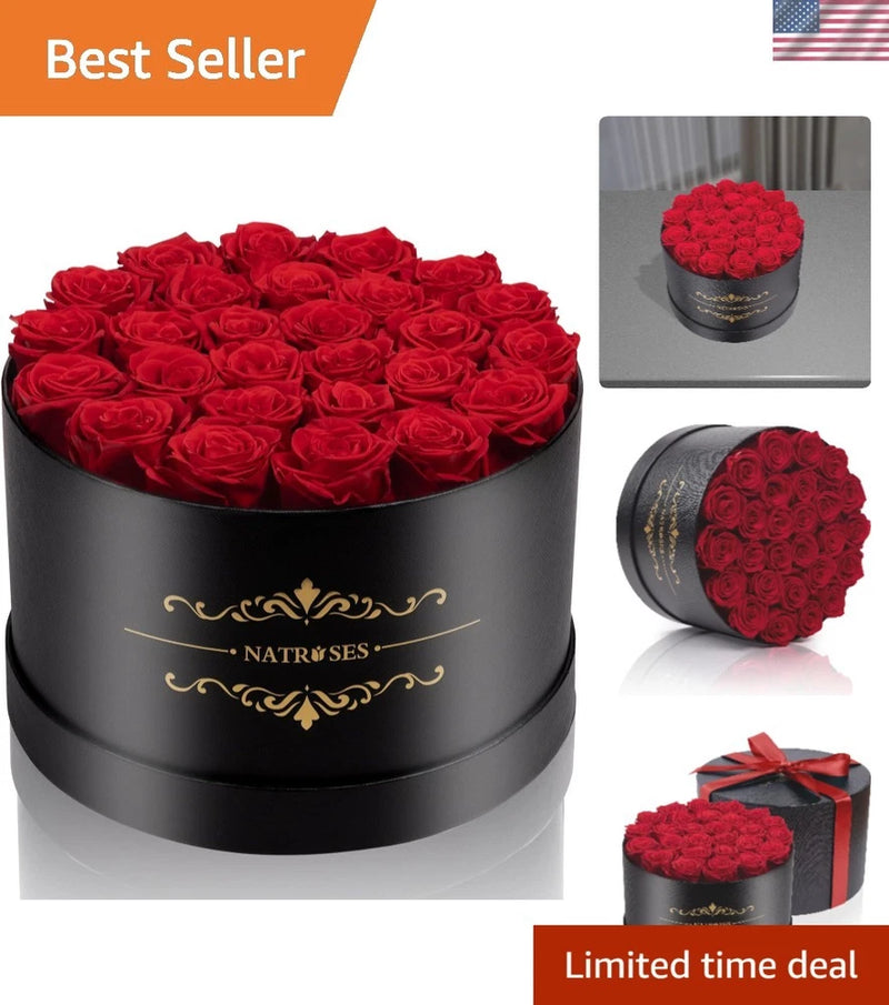 Black gift box of preserved red roses with gold ornament lettering