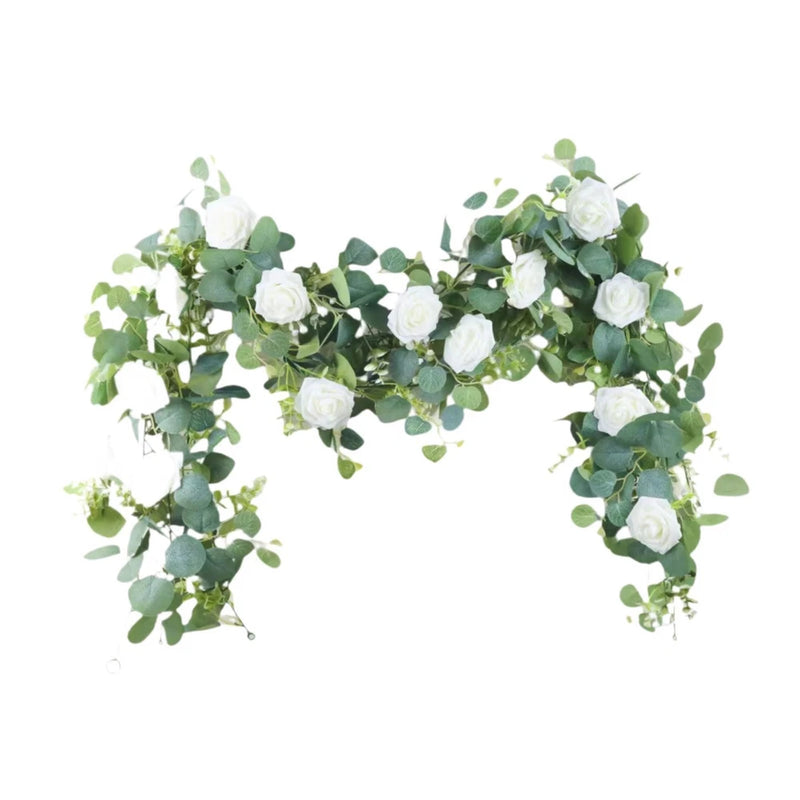 Artificial eucalyptus garland with green leaves and white blooms, draped wreath-style