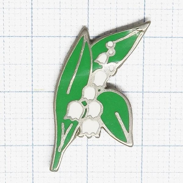 Green and white lily of the valley enamel pin badge with metal border