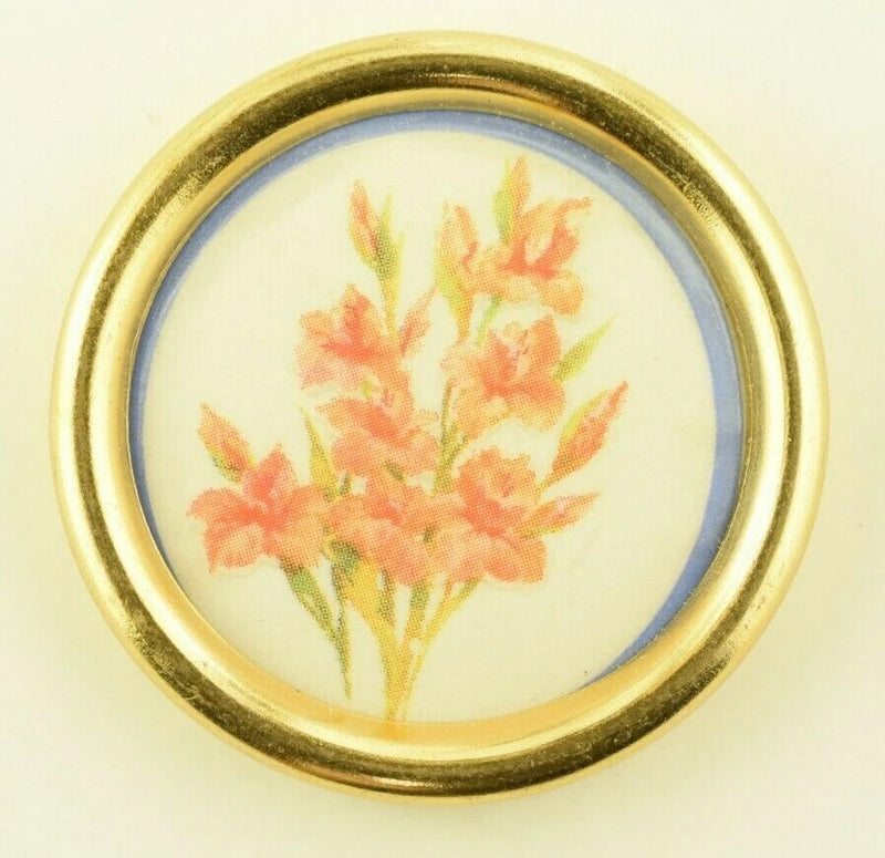 Gold-tone circular art button with pastel flower bouquet print