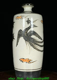 White porcelain bottle vase with painted phoenix bird and peony-flower accents, narrow neck