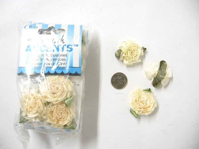Offray cream ribbon carnation flowers with pale green leaves, 3-pack in clear bag