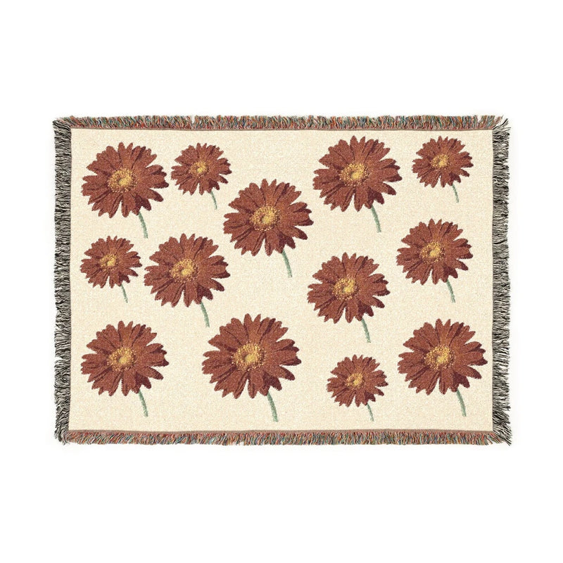 Floral woven throw blanket with brown sunflower pattern and fringed edges