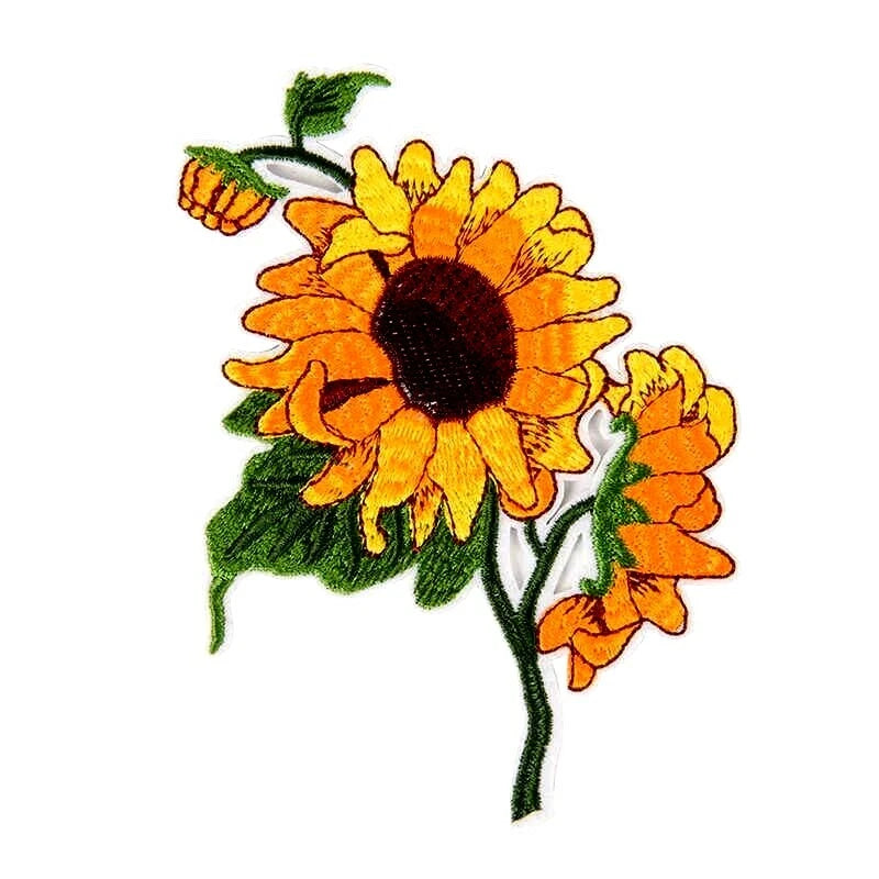 Embroidered iron-on patch with two orange sunflowers and green leaves