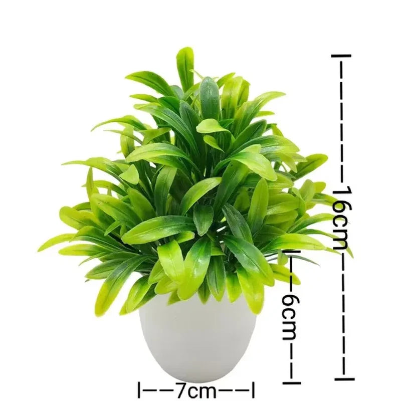 Artificial potted plant with bright green plastic leaves in a white round pot