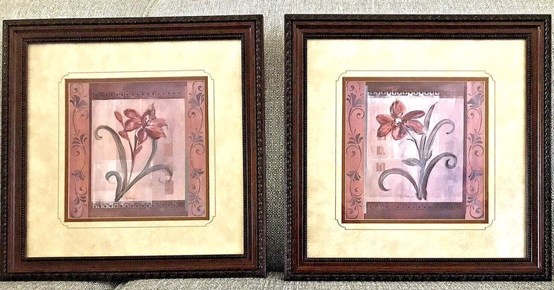 Framed floral art prints with pink lily illustrations in square dark brown frames