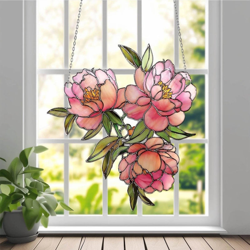 Peony flower acrylic window suncatcher with pink and orange blossoms, hanging by chains