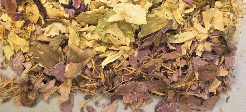 Dried lotus flower blend with tan and purple dried petals and pale yellow flakes