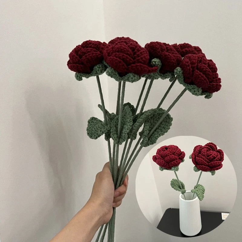 Dried rose flower bouquet with dark red blooms and green stems