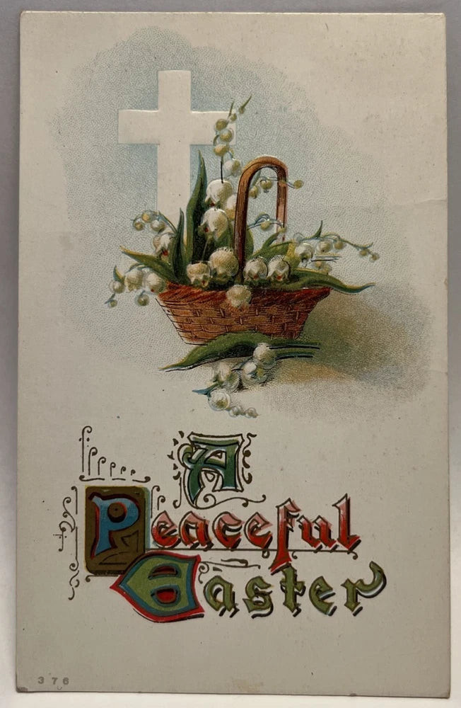 Vintage Easter postcard with flower basket, cross, and "Peaceful Easter" lettering