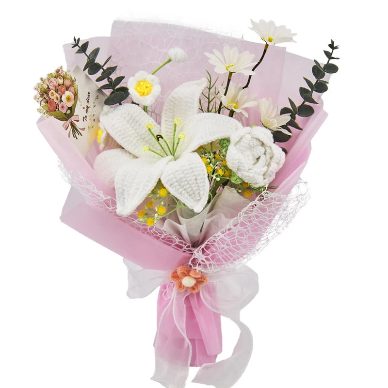 Crochet flower bouquet with white blossoms, yellow centers, green leaves, wrapped with pink bow