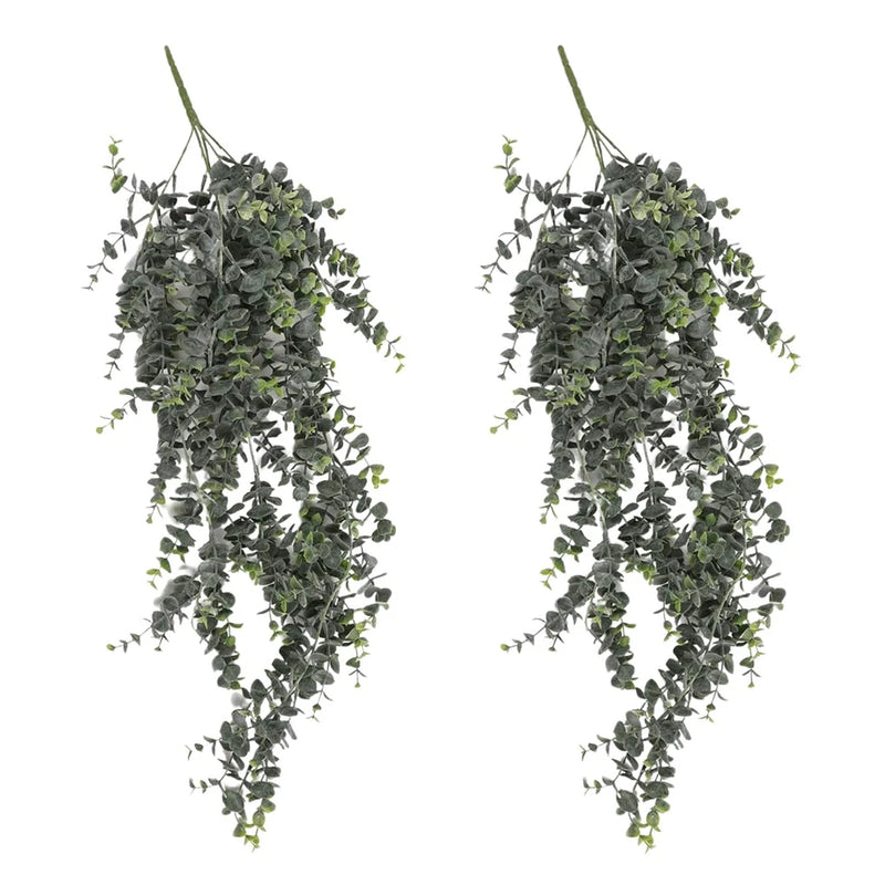 Artificial hanging eucalyptus greenery bush with long trailing stems and small green leaves