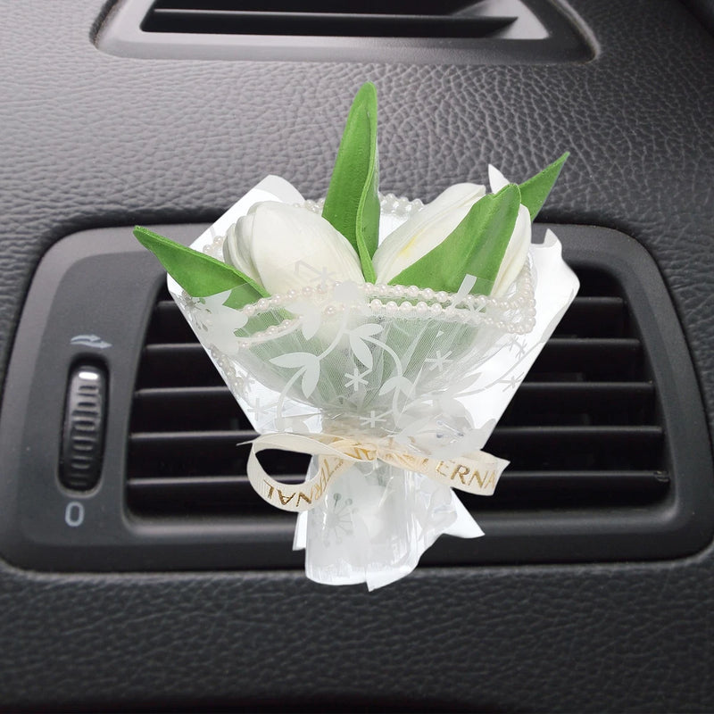 White dried rose bouquet car vent clip diffuser with green leaves
