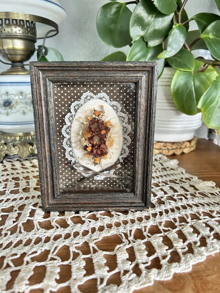 Small framed dried flower lace art, dark wood frame with pressed flower centerpiece