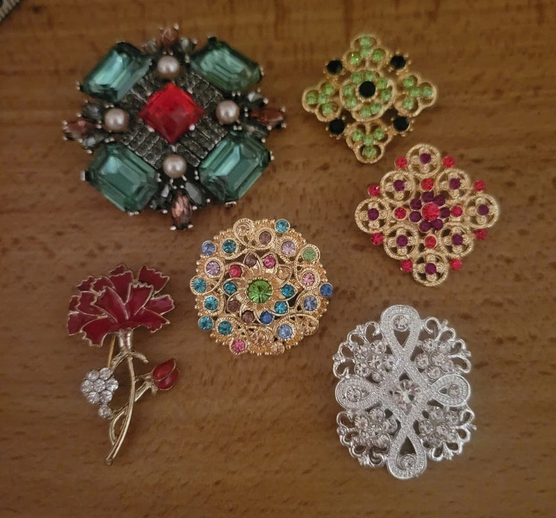 Multicolor rhinestone flower brooch lot, assorted floral designs with pin backs