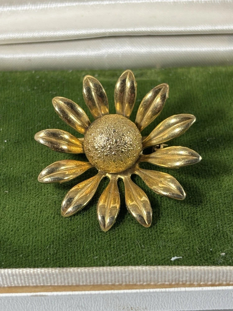 Goldtone textured layered sunflower flower brooch with raised center detail