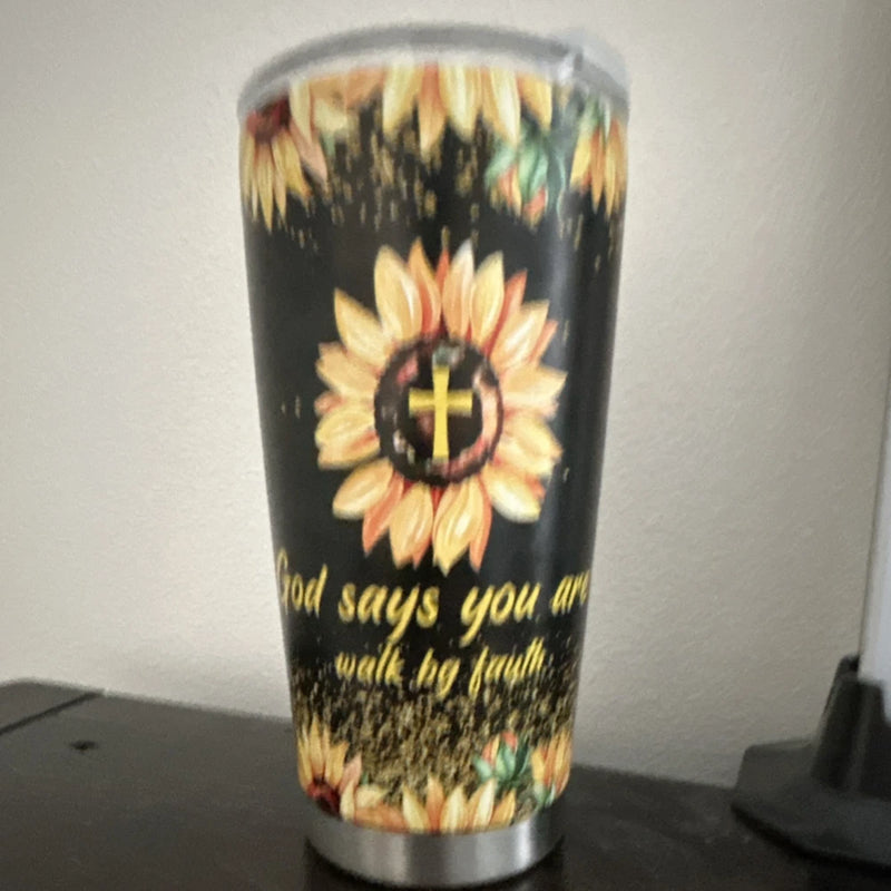 Sunflower-printed travel tumbler with black base, colorful sunflower graphic, and silver lid