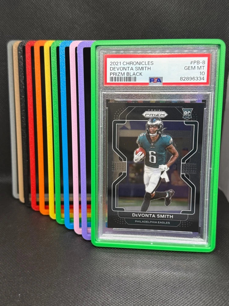 Graded card bumper case with PSA slab, shown in green and multiple bright colors