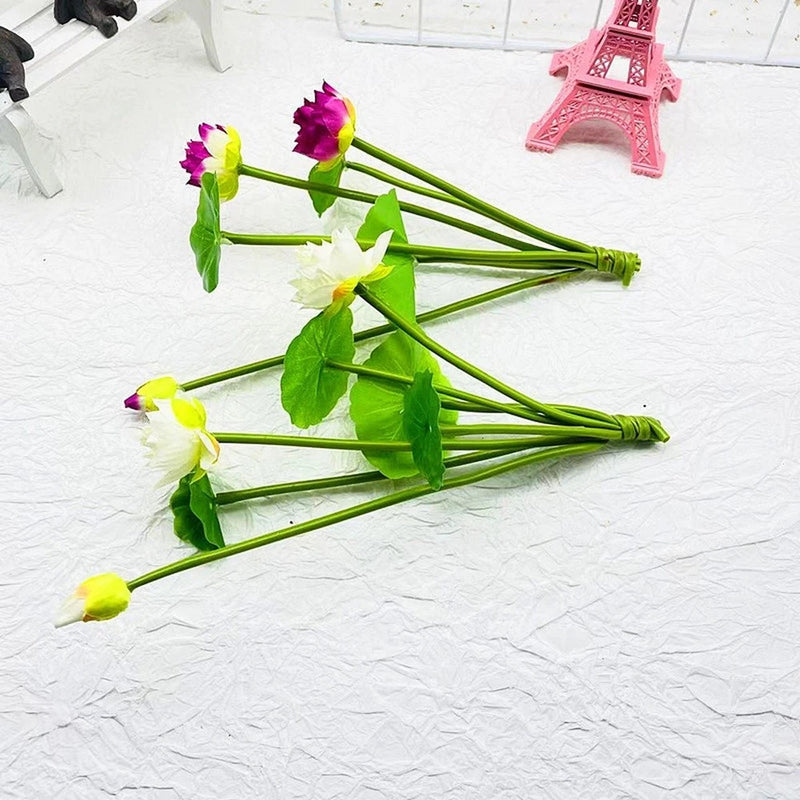 Artificial water lily flower stems with green leaves, purple, white, and lime blooms