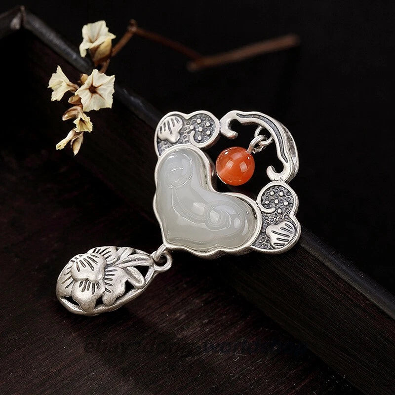 Sterling silver ruyi jade pendant with orange bead and floral inlay