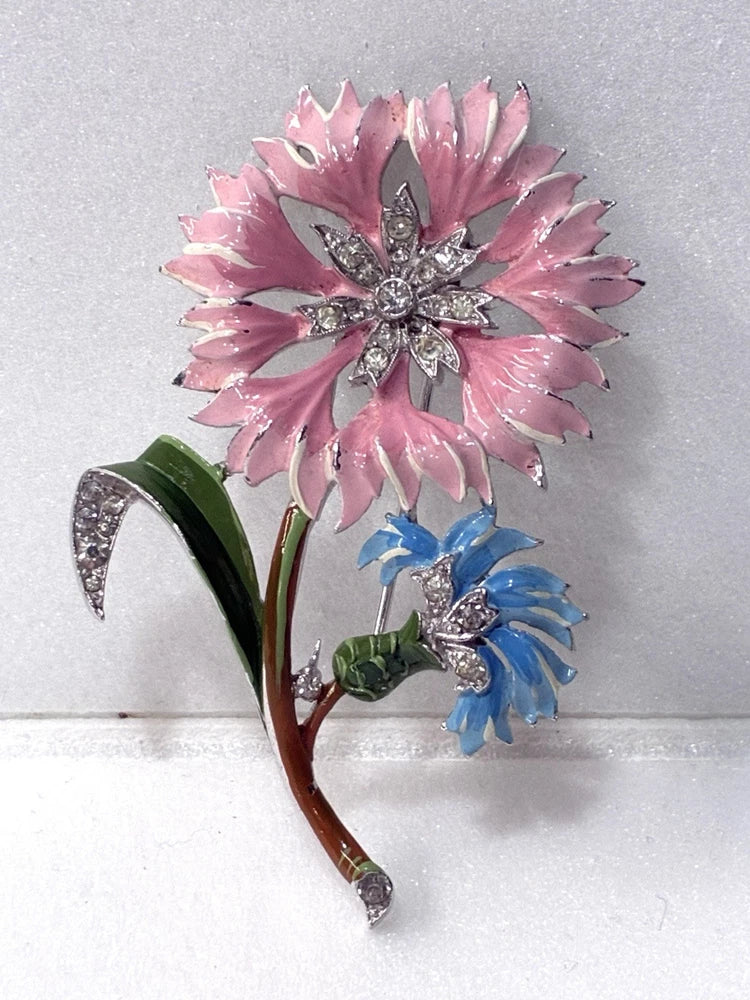 Pink carnation flower figural brooch with blue blooms, green leaves, silver-tone pin