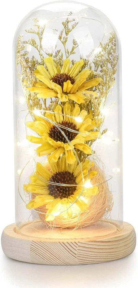 Glass dome artificial sunflower with warm LED lights and yellow blooms on wooden base