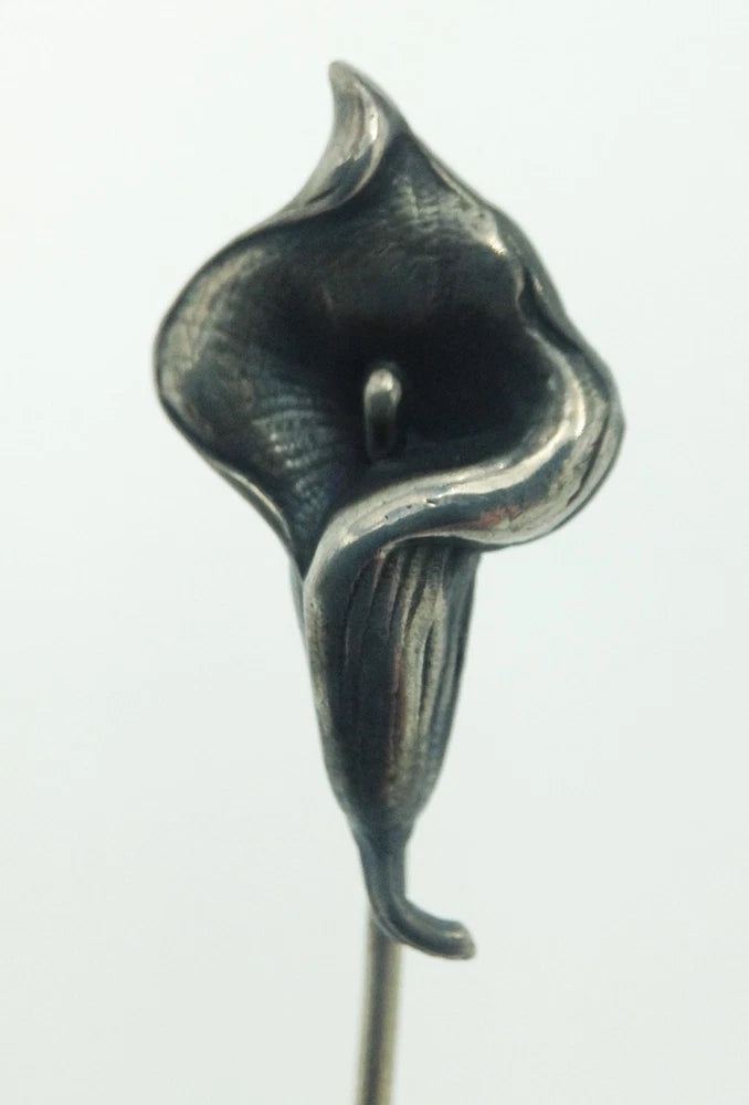 Oxidized sterling silver calla lily stick pin with Art Nouveau curves