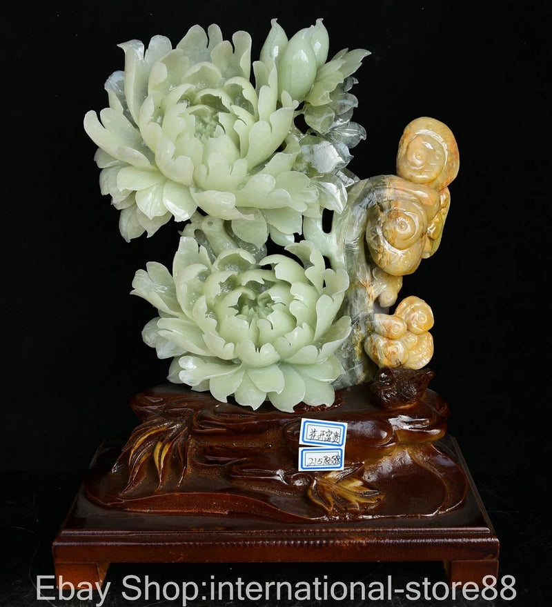 Jade peony flower and snail lucky sculpture on carved dark base with blue label