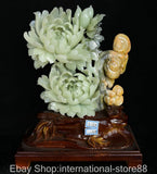 Jade peony flower and snail lucky sculpture on carved dark base with blue label