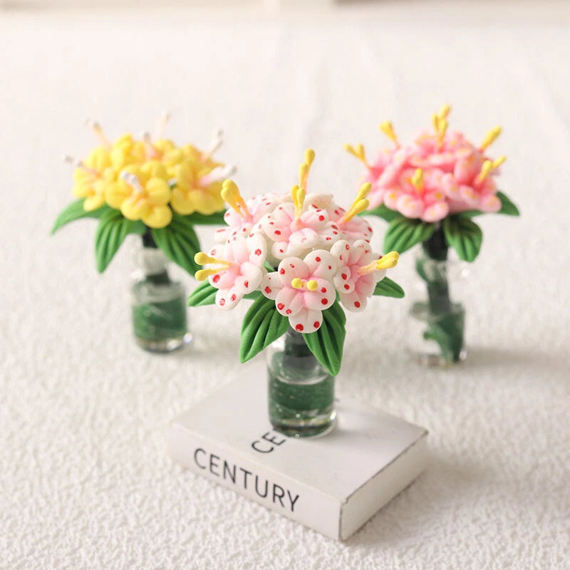 Mini dollhouse lily plant set: pink and white speckled flowers in clear vases
