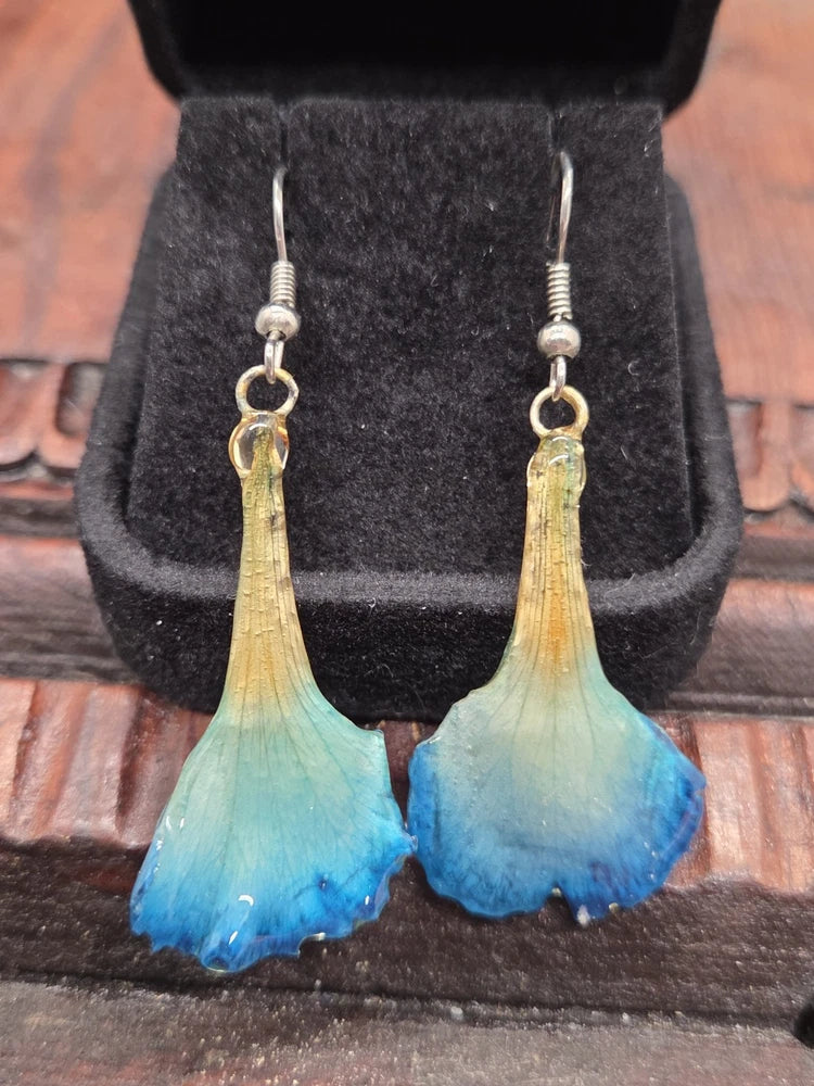 Blue resin flower drop earrings with silver hooks, teardrop petals