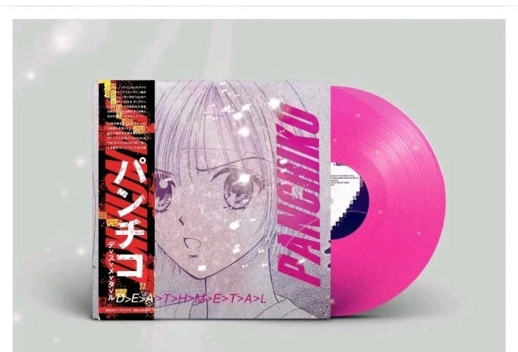 Pink vinyl LP with sparkly album cover and visible disc edge