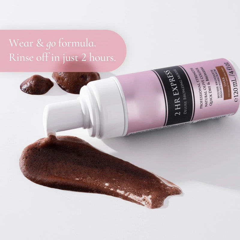 Self tan mousse bottle with pump, dark-brown tan smear, pink label