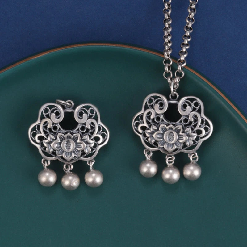 S925 sterling silver peony ruyi lock pendant with hollow floral center and 3 bead tassels