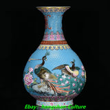 Turquoise porcelain vase with peacock and peony floral detailing, ornate rim and trim